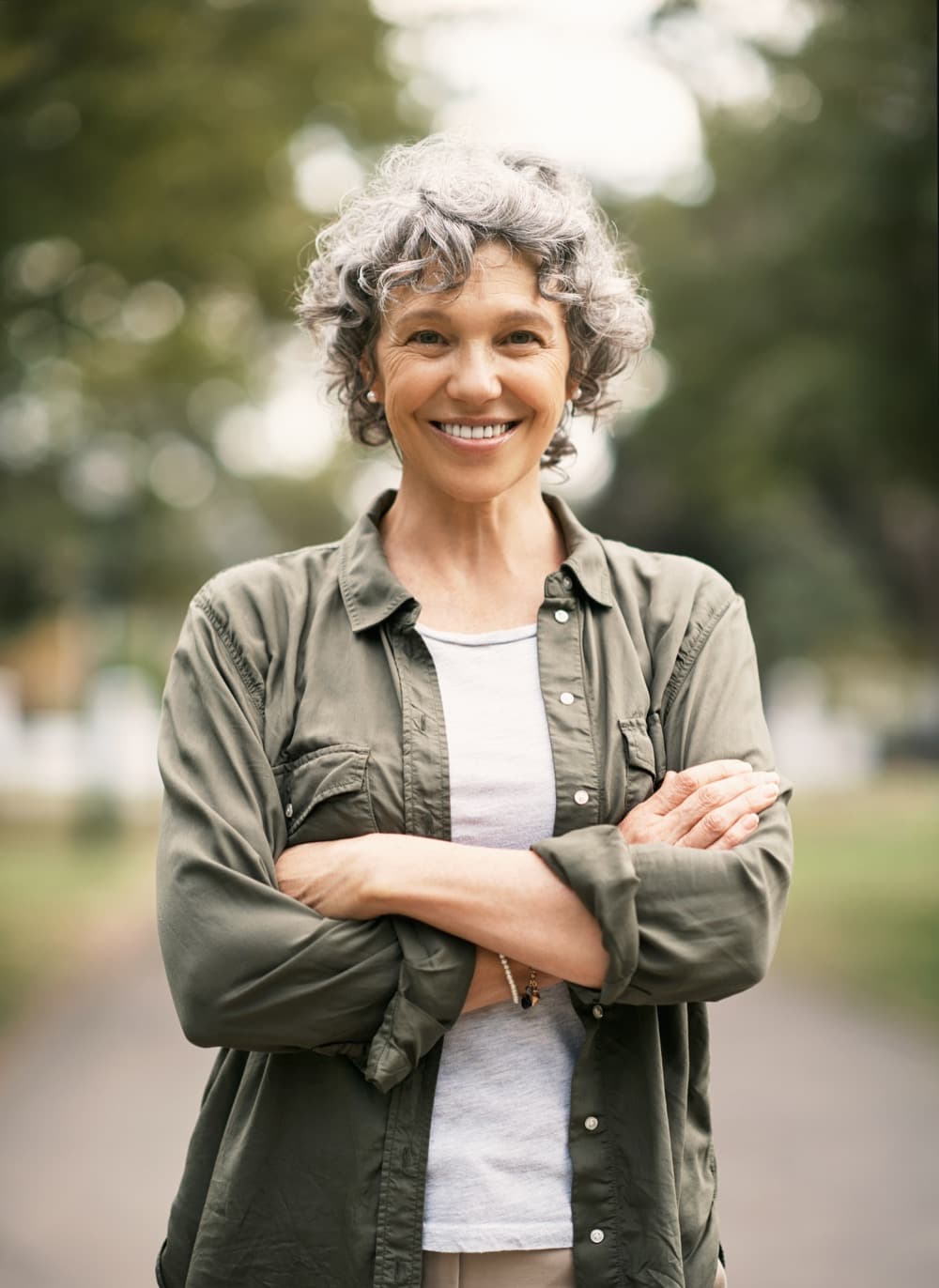Smiling woman standing outdoors